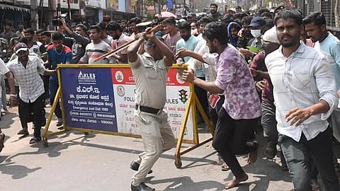 Police lathi charge protesters demanding the filling of vacant government posts, in Dharwad.