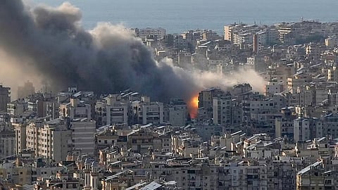 Flames and smoke rising after Israeli airstrikes on Dahiyeh, a southern suburb of Beirut, Lebanon, on Monday.