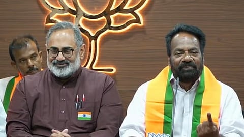 MJ Job (right) with BJP state president Rajeev Chandrasekar