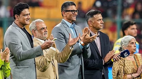 Former India captains Anil Kumble and Rahul Dravid with KSCA president Venkatesh Prasad and secretary Santosh Menon during an event where the two bowling ends