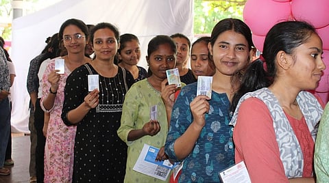 Women standing in queue to cast their vote in Bagalkot on Thursday.