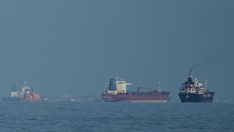 oil tankers and cargo ships are seen lining up