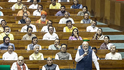 Prime Minister Narendra Modi speaks in the Lok Sabha during the special session of Parliament in New Delhi