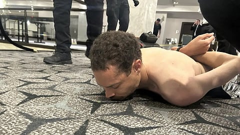 Secret Service agents detain the suspected shooter