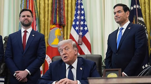 President Donald Trump speaks as Secretary of State Marco Rubio, right, and Vice President JD Vance listen in the Oval Office at the White House, Thursday.