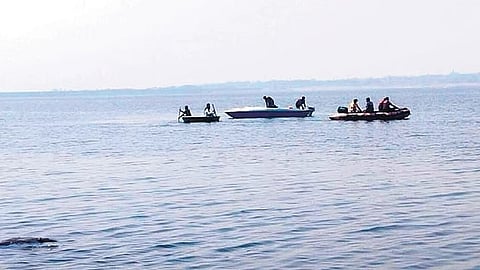Rescue operations under way after a boat capsized in the KRS backwaters on Friday.