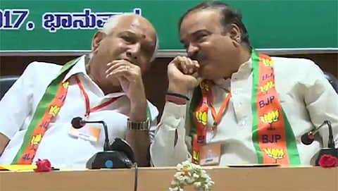 ಸಂಭಾಷಣೆ ನಿರತ ಬಿಎಸ್ ವೈ ಹಾಗೂ ಯಡಿಯೂರಪ್ಪ