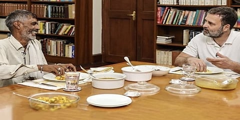 ತರಕಾರಿ ಮಾರಾಟಗಾರನ ಜೊತೆಗೆ ರಾಹುಲ್ ಭೋಜನದ ಚಿತ್ರ