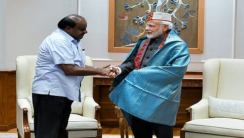 ಕುಮಾರಸ್ವಾಮಿ ಮತ್ತು  ನರೇಂದ್ರ ಮೋದಿ