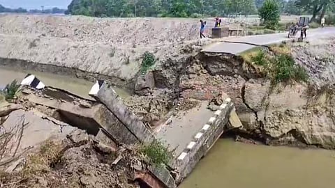 A bridge over a canal after it collapsed, in Bihar's Siwan district