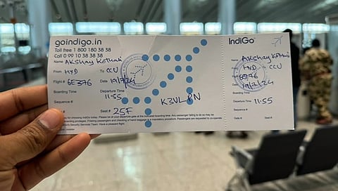 A handwritten boarding pass issued by the Indigo Airlines after their services were affected by the MIcrosoft outage.