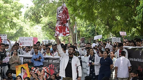 Doctors stage a protest march against the rape and murder of a trainee doctor in Kolkata