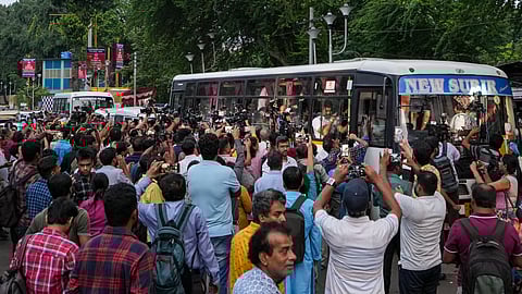 A delegation of junior doctors boards a bus from their dharna site near Swasthya Bhawan for a meeting with West Bengal Chief Minister Mamata Banerjee at her Kalighat residence, in Kolkata
