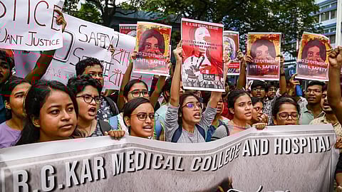 Junior doctors protest against the alleged rape and killing of a trainee doctor, at RG Kar Medical College and Hospital in Kolkata, Saturday, Aug 10, 2024.