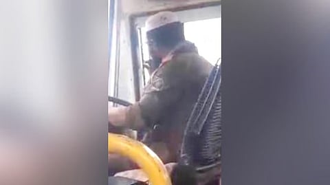 Bus driver smoking while driving 
