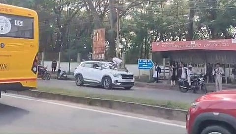Driver tries to run over traffic cop 