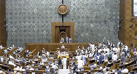 Members leave the Lok Sabha and Rajya Sabha after parliamentary proceedings in both houses were adjourned for the day on Wednesday, Nov. 27, 2024.