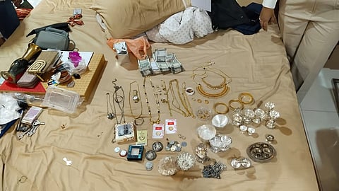 Jewels and cash seized from the residence of an official