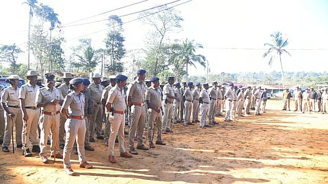 Police stand guard outside the Mrityunjaya Temple premises