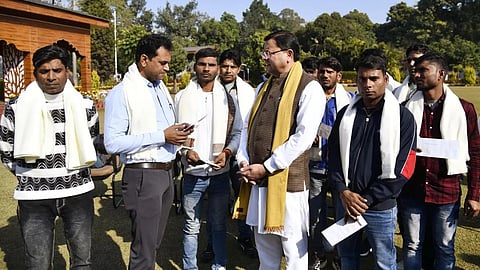 Uttarakhand CM Pushkar Singh Dhami with the rat miners who rescued the 41 workers/