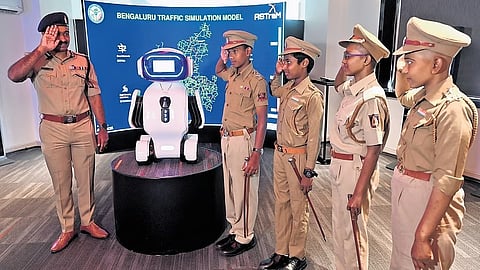 Four children battling cancer, dressed in police uniforms as part of World Cancer Day, salute Joint Commissioner of Police (Traffic) MN Anucheth in Bengaluru on Tuesday