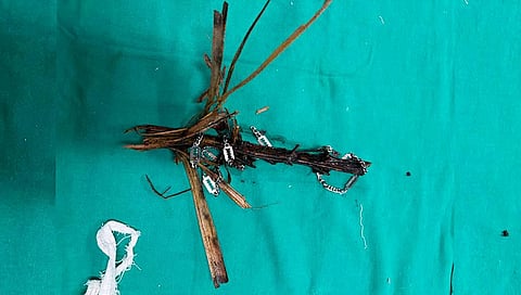 A wooden piece pierced his neck and lodged in his chest