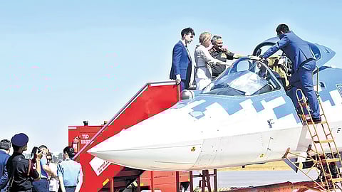 Chief of Defence Staff General Anil Chauhan takes a look at the Su-57 on display at Aero India 2025 in Bengaluru on Wednesday.
