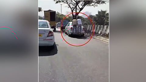 stunt on moving car in Bengaluru