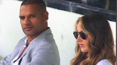 Shikhar Dhawan was spotted sitting beside a pretty lady