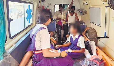 School girls, who fell ill after they were sprayed with spurious colour, being taken to a hospital in Gadag on Friday.