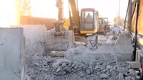 Concrete barricades being removed after the eviction of agitating farmers from the Shambhu border, Thursday, March 20, 2025.