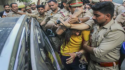 Police intervene as lawyers trash accused Sahil Shukla while he was being produced in a court in connection with Merchant Navy officer Saurabh Rajput's killing, in Meerut, Wednesday, March 19, 2025.PTI