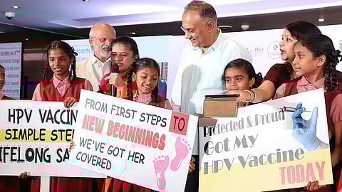 Health and Family Welfare Minister Dinesh Gundu Rao with students during the Cervical Cancer elimination movement from awareness to Action Cervical Cancer free Karnataka at a private hotel, in Bengaluru on Wednesday.