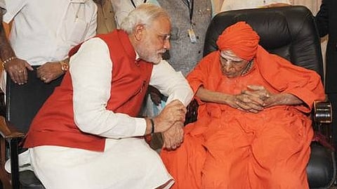 ಪ್ರಧಾನಮಂತ್ರಿ ನರೇಂದ್ರ ಮೋದಿ ಹಾಗೂ ಶಿವಕುಮಾರ ಸ್ವಾಮೀಜಿ (ಸಂಗ್ರಹ ಚಿತ್ರ)