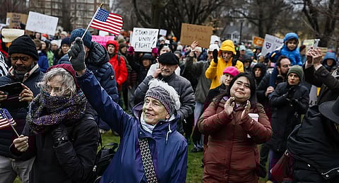 Hundreds of demonstrators gather on Cambridge Common during a rally at the historic park in Cambridge, Mass., Saturday, April 12, 2025, calling on Harvard University to resist what organizers described as attempts by President Trump to influence the institution.