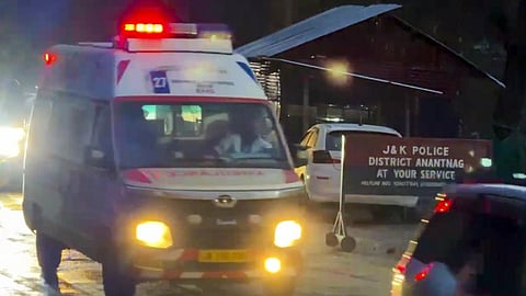 Ambulances drive past Langanbal in Pahalgam enroute