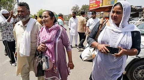 Indian citizens from Pakistan reach the Attari border which is now closed
