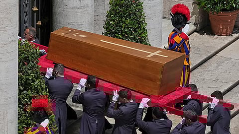 The coffin of Pope Francis is carried inside St. Mary Major Basilica for his burial ceremony, in Rome, Saturday, April 26, 2025.