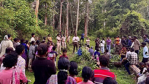 The tribals talking to forest officials in the Nagarahole Tiger Reserve