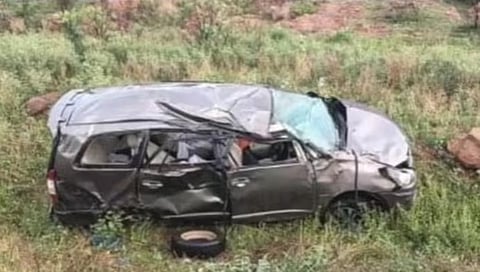 Innova car overturns 