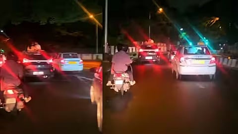 ಚಲಿಸುವ ಕಾರಿನ ಸನ್‌ರೂಫ್ ತೆಗೆದು ಜೋಡಿ Kissing: ವಿಡಿಯೋ ವೈರಲ್, ನೆಟ್ಟಿಗರಿಂದ ಭಾರೀ ಟೀಕೆ
