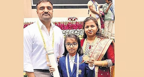 Charvi with parents 