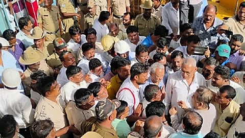 labourers stopped work and held a dharna in front of the company office,