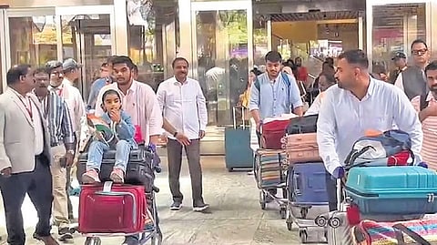 Evacuees from Iran arrive at the Kempegowda International Airport in Bengaluru on Sunday.