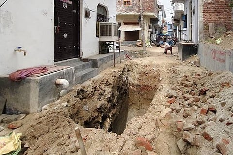 The 10-foot-deep pit in Faridabad from where the victim's body