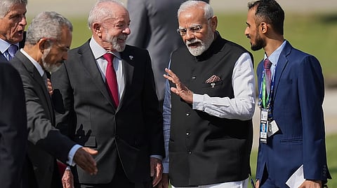 PM Modi, second from right, chats with Brazilian President Luiz Inacio Lula da Silva during the 17th annual BRICS summit in Rio de Janeiro, Sunday, July 6, 2025.