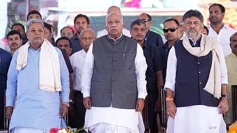 CM Siddaramaiah, AICC president Mallikarjun Kharge and Deputy CM DK Shivakumar at the Congress convention in Mysuru on Saturday.