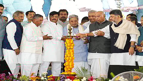 CM Siddaramaiah, AICC president Mallikarjun Kharge and Deputy CM DK Shivakumar at the Congress convention in Mysuru on Saturday.