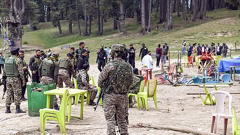 Security personnel inspect the Baisaran Valley site in Pahalgam following the terrorist attack that took place on April 22.