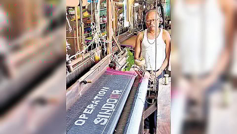 Weaver Tejappa Chinnur works at his loom, making an ‘Operation Sindoor